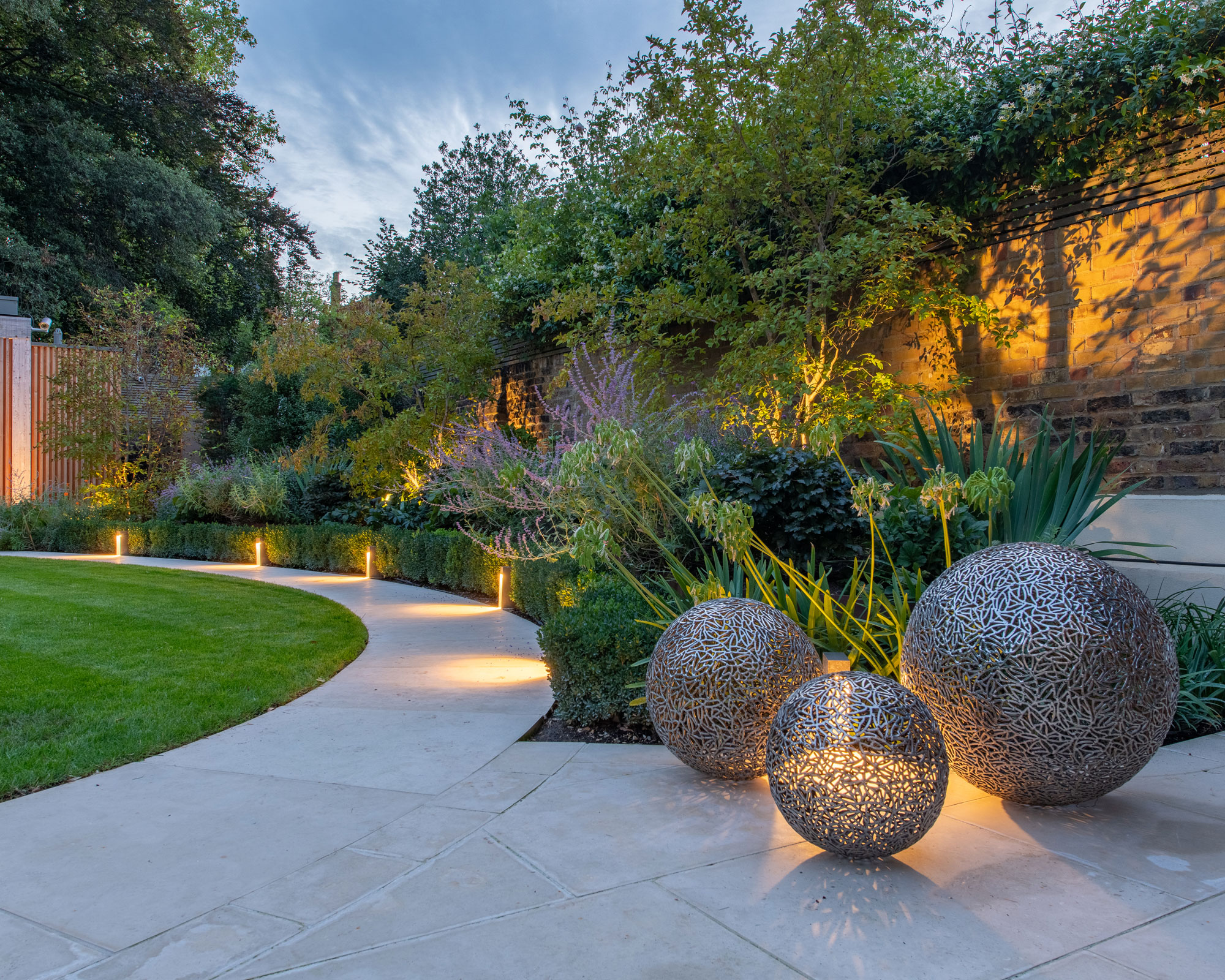 A beautifully finished roof, driveway and landscaped garden by Advanced Roofers Ltd